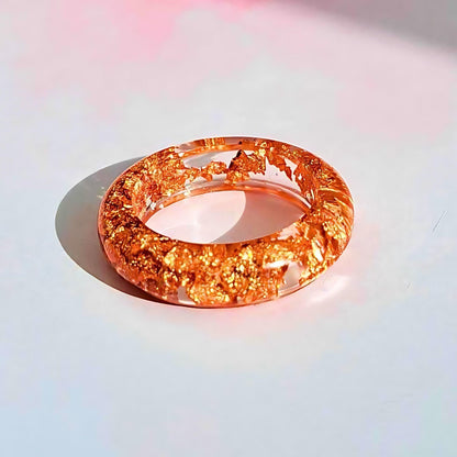 Clear Acrylic Ring with Metallic Rose Gold Flakes